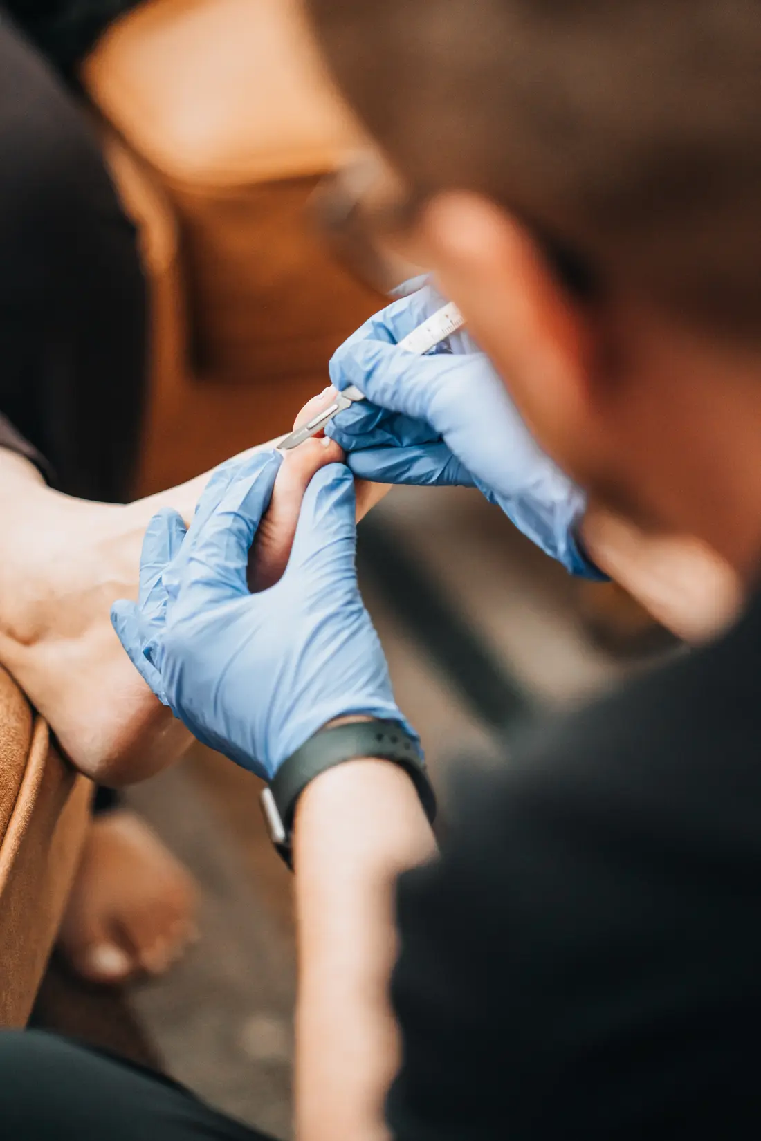 Podiatrist treating skin and forefoot discomfort